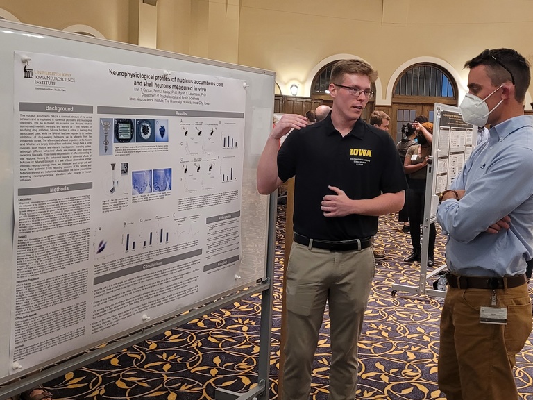 Student presenting Poster